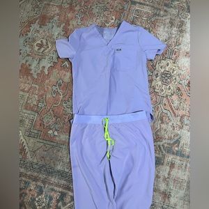 Figs scrubs. Both top and bottom. Size large. Color is Lavender Dew